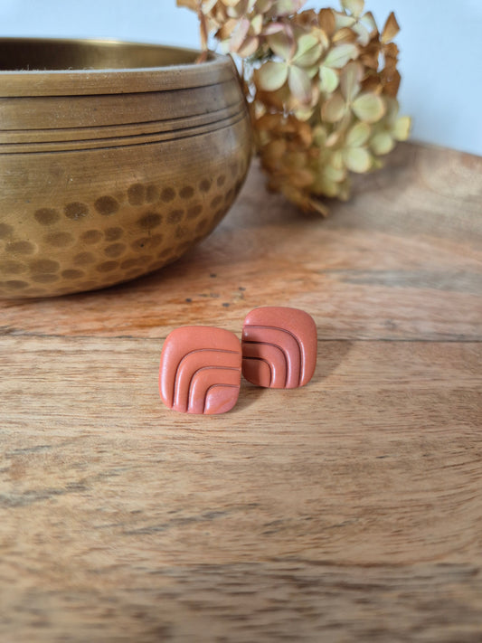 Puces d'oreilles polymère